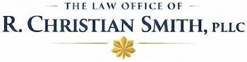 Logo for The Law Office of R. Christian Smith, PLLC, featuring a gold oak leaf and text.