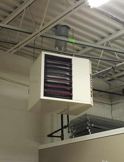 Overhead HVAC duct labeled 