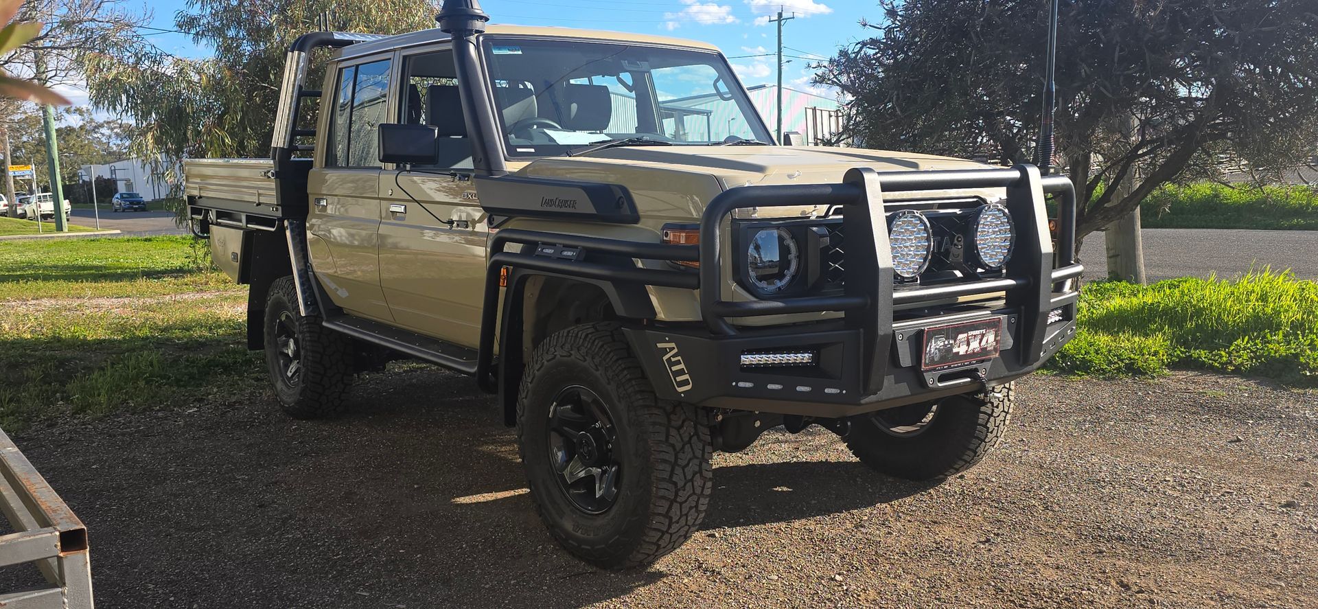 Red Truck with Black Bumper Guard, Inside a Garage — Sparky's 4x4 In Taminda, NSW