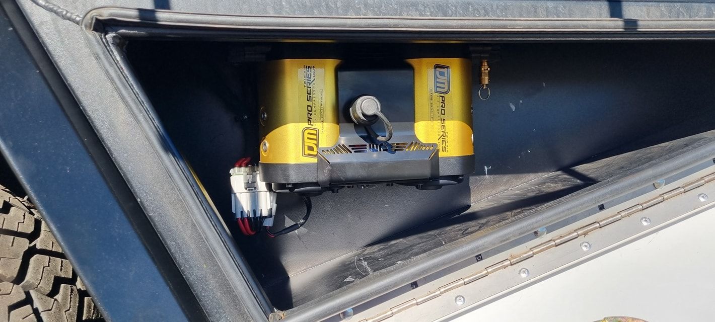 Yellow and Black Surveying Equipment Mounted Inside a Vehicle Storage — Sparky's 4x4 In Armidale, NSW