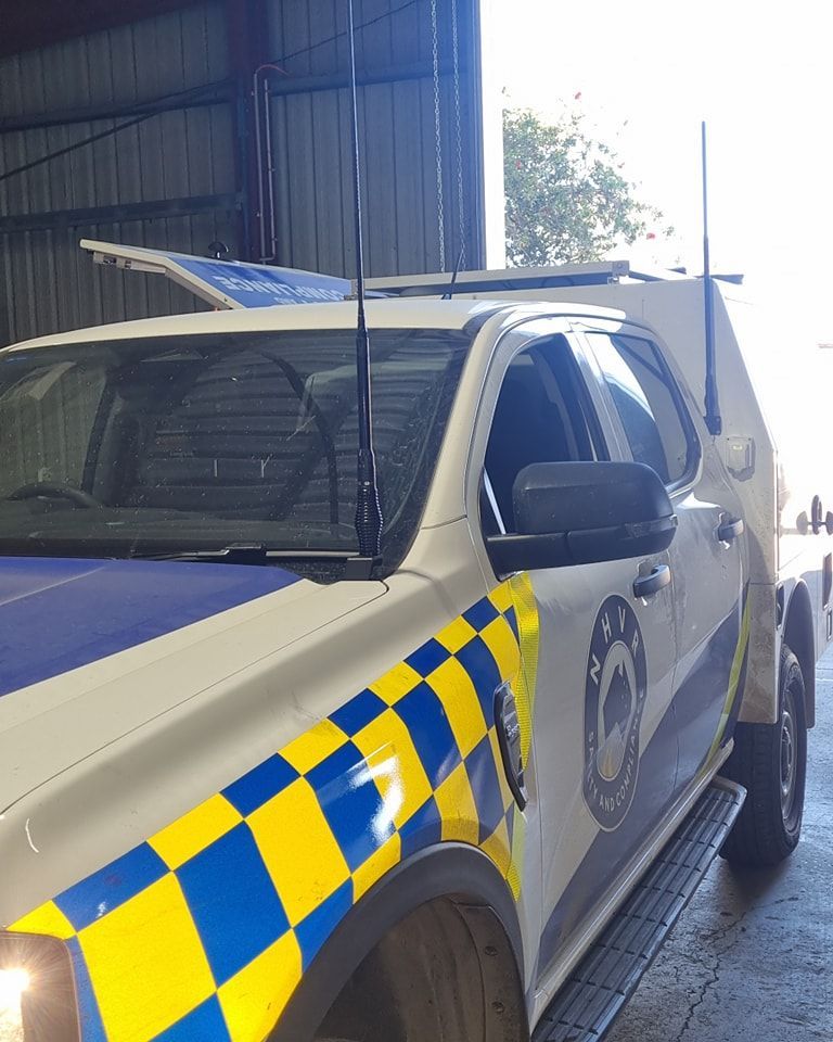 Police Vehicle with Blue and Yellow Checkered Pattern — Sparky's 4x4 In Gunnedah, NSW