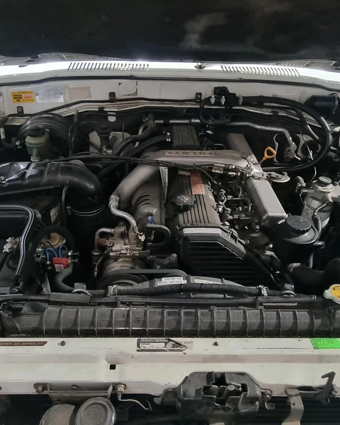 Engine of A White Vehicle, Viewed from Above, Showing Various Components — Sparky's 4x4 In Taminda, NSW