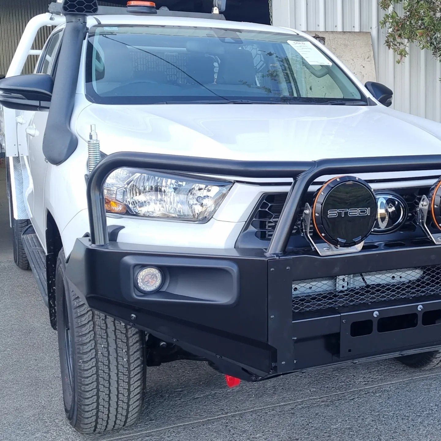 White Toyota Truck with Black Bull Bar, Snorkel, and Spotlights — Sparky's 4x4 In Taminda, NSW