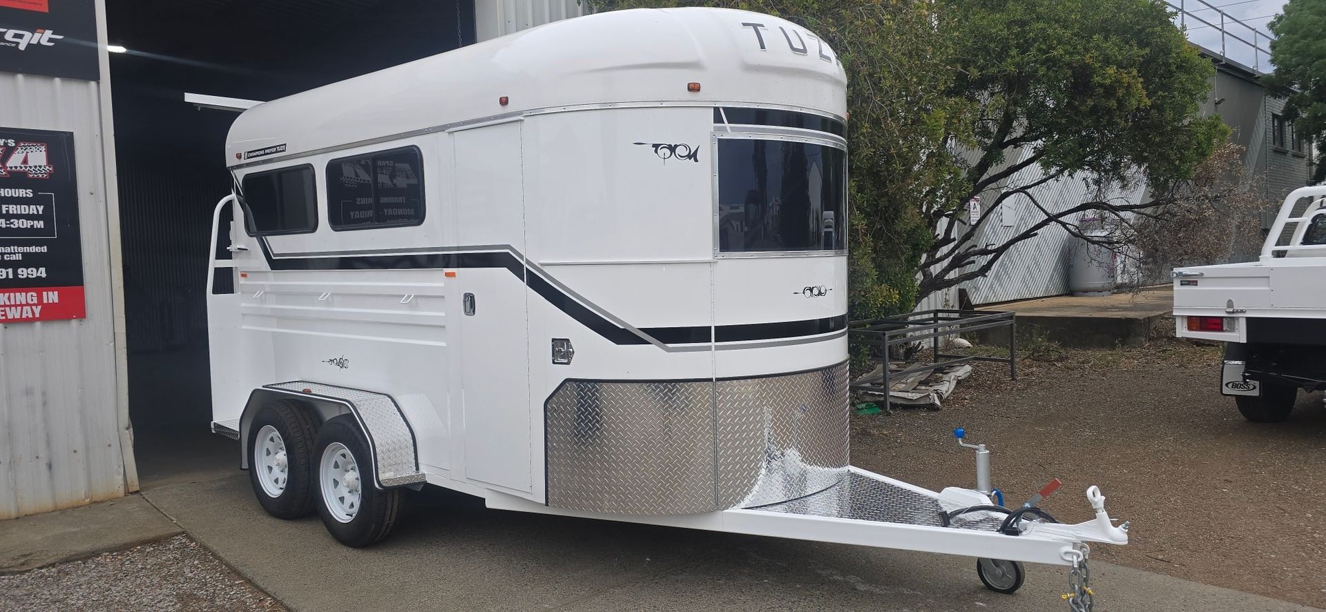 White Horse Trailer with A Silver Front, Parked Outside — Sparky's 4x4 In Taminda, NSW