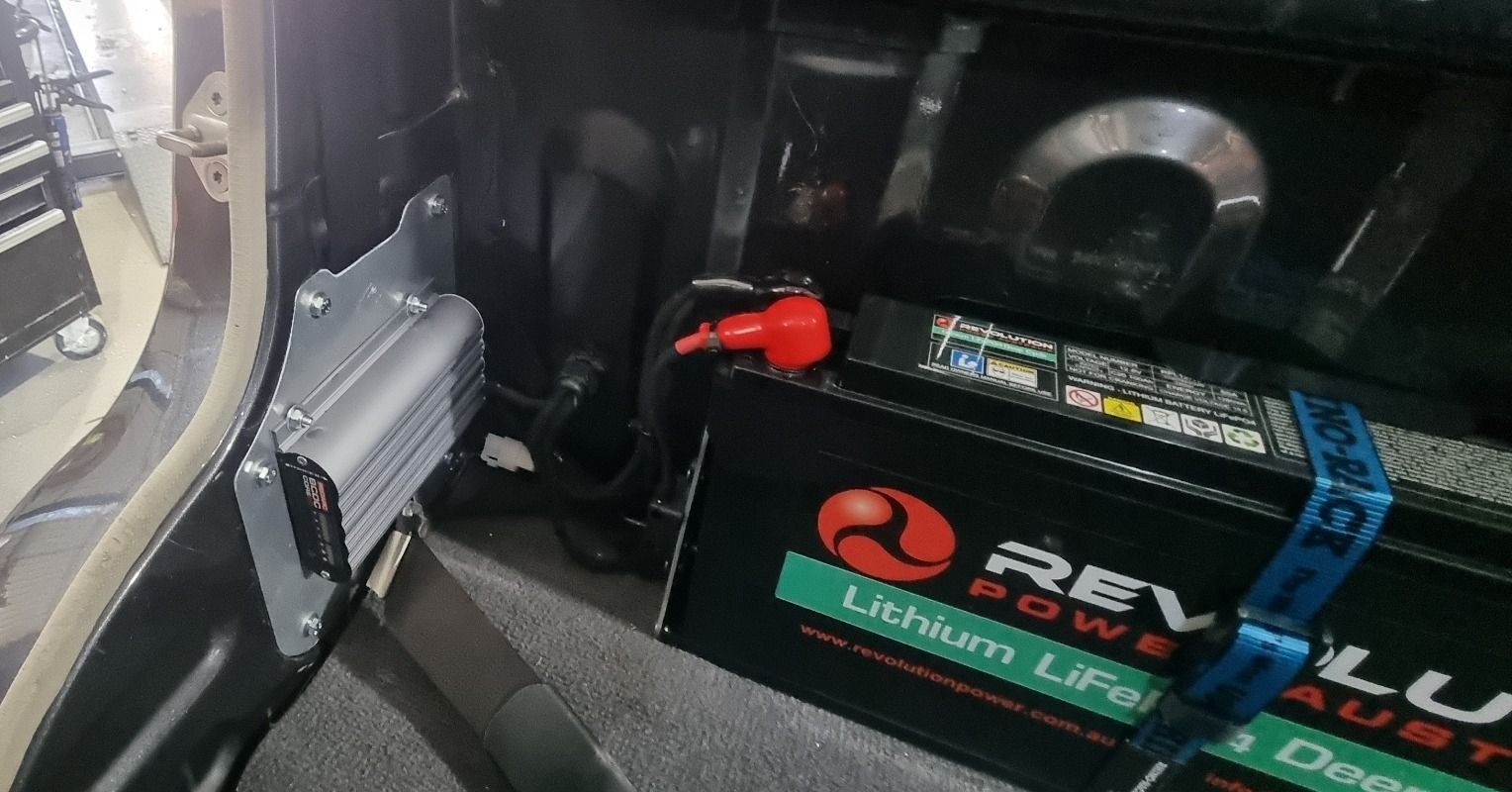 Two Batteries Are Sitting Under the Hood of a Car — Sparky's 4x4 In Taminda, NSW