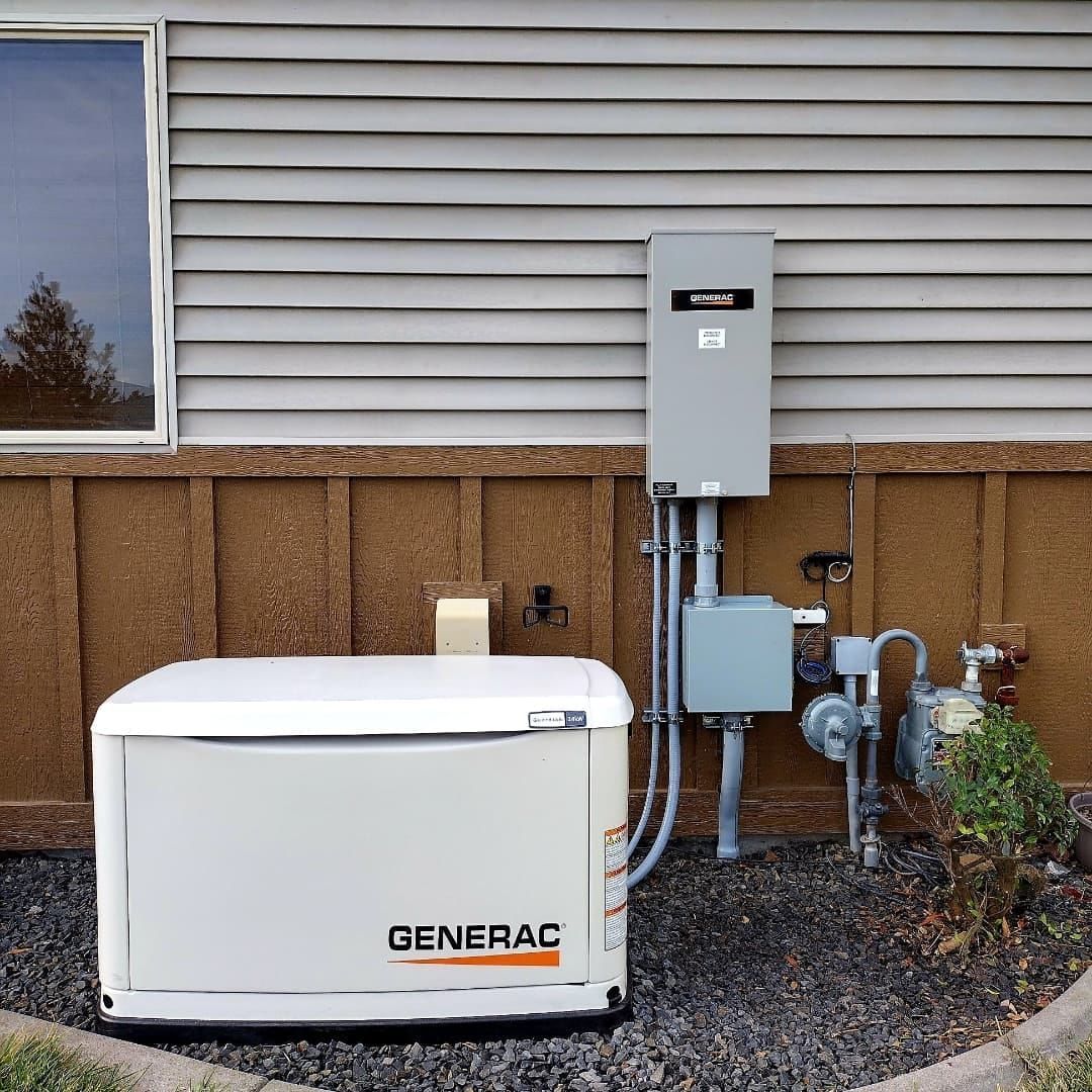 Generac home generator beside electrical panel and utility meters outside a house