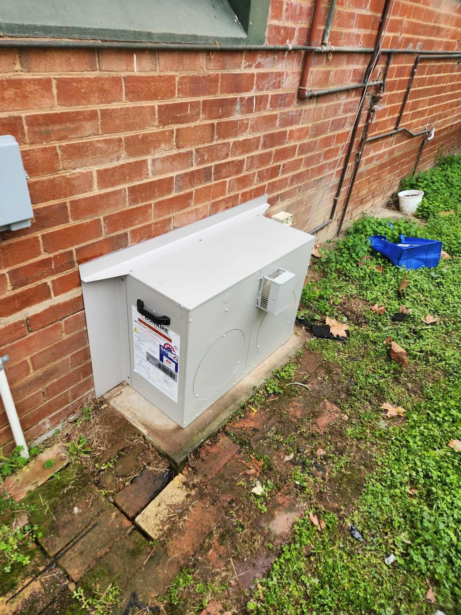 Exterior of a Building With Grey and White Walls — Craig Stewart Electrical in East Wagga Wagga, NSW