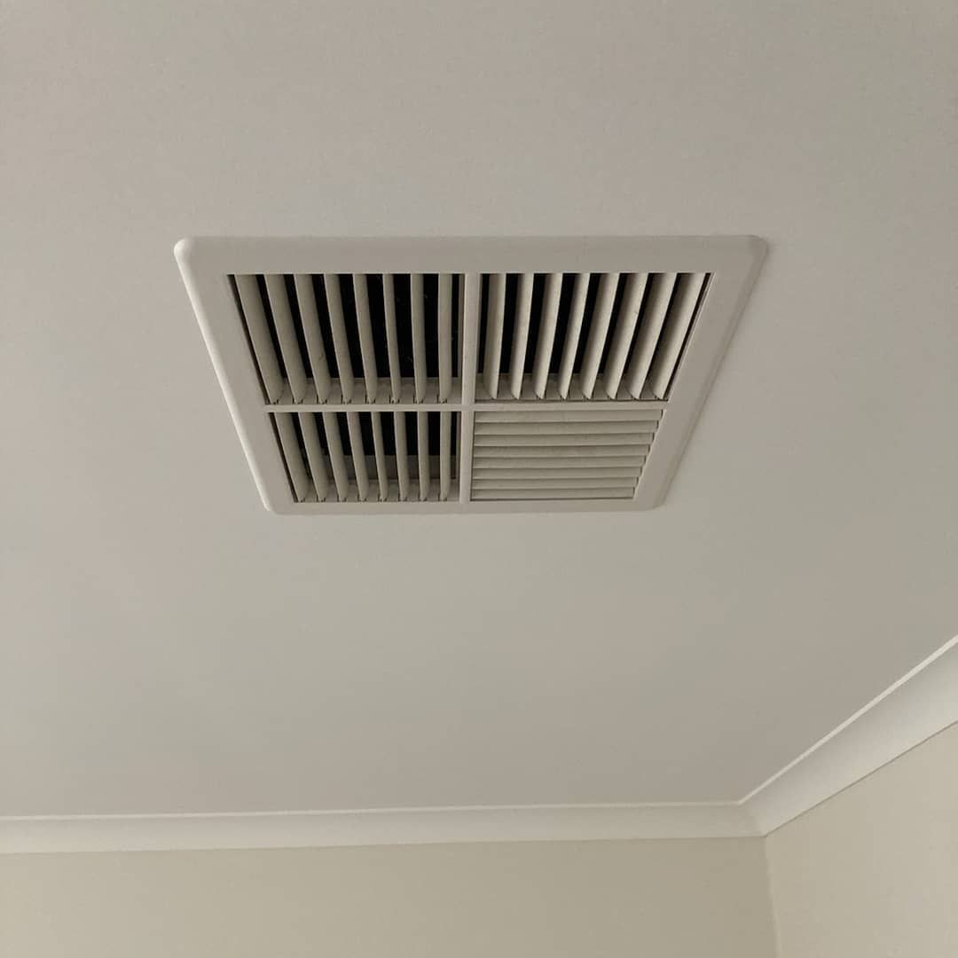 Square White Ceiling Vent With Slotted Grates — Craig Stewart Electrical in East Wagga Wagga, NSW