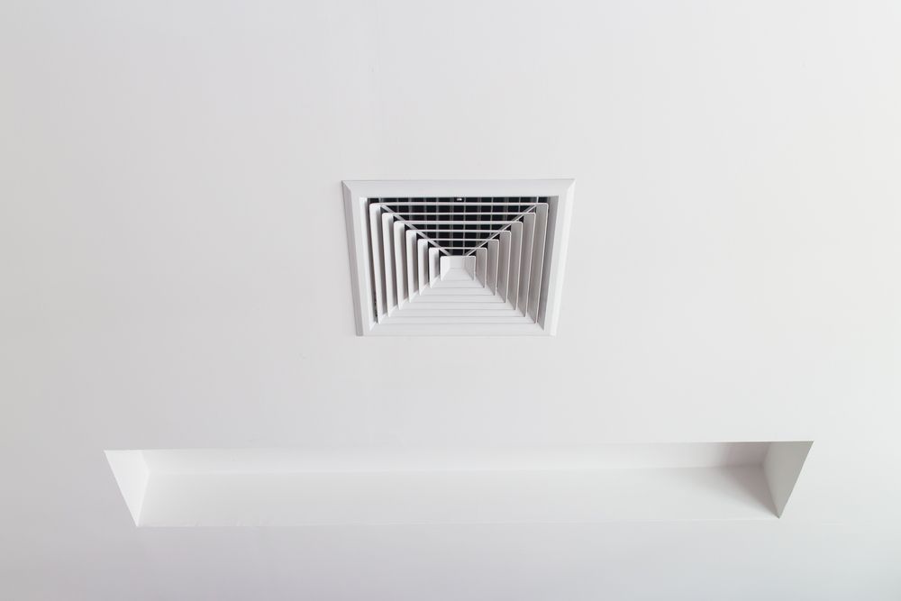 White Ceiling With Square Air Vent and Recessed Shelf — Craig Stewart Electrical in East Wagga Wagga, NSW