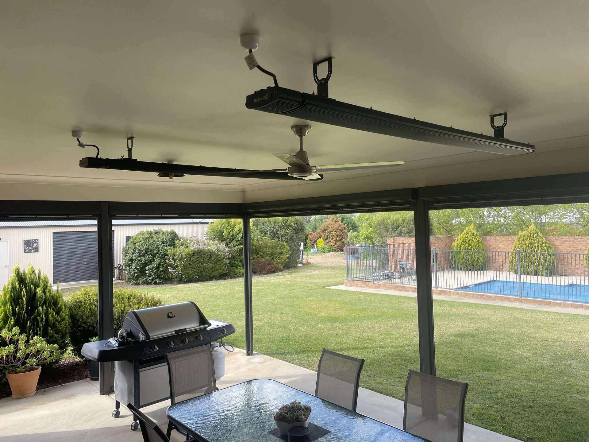 Electrician Installing a Wall Outlet With a Screwdriver — Craig Stewart Electrical in East Wagga Wagga, NSW