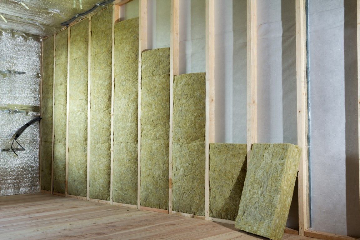 Batt insulation installed between wall studs in a home