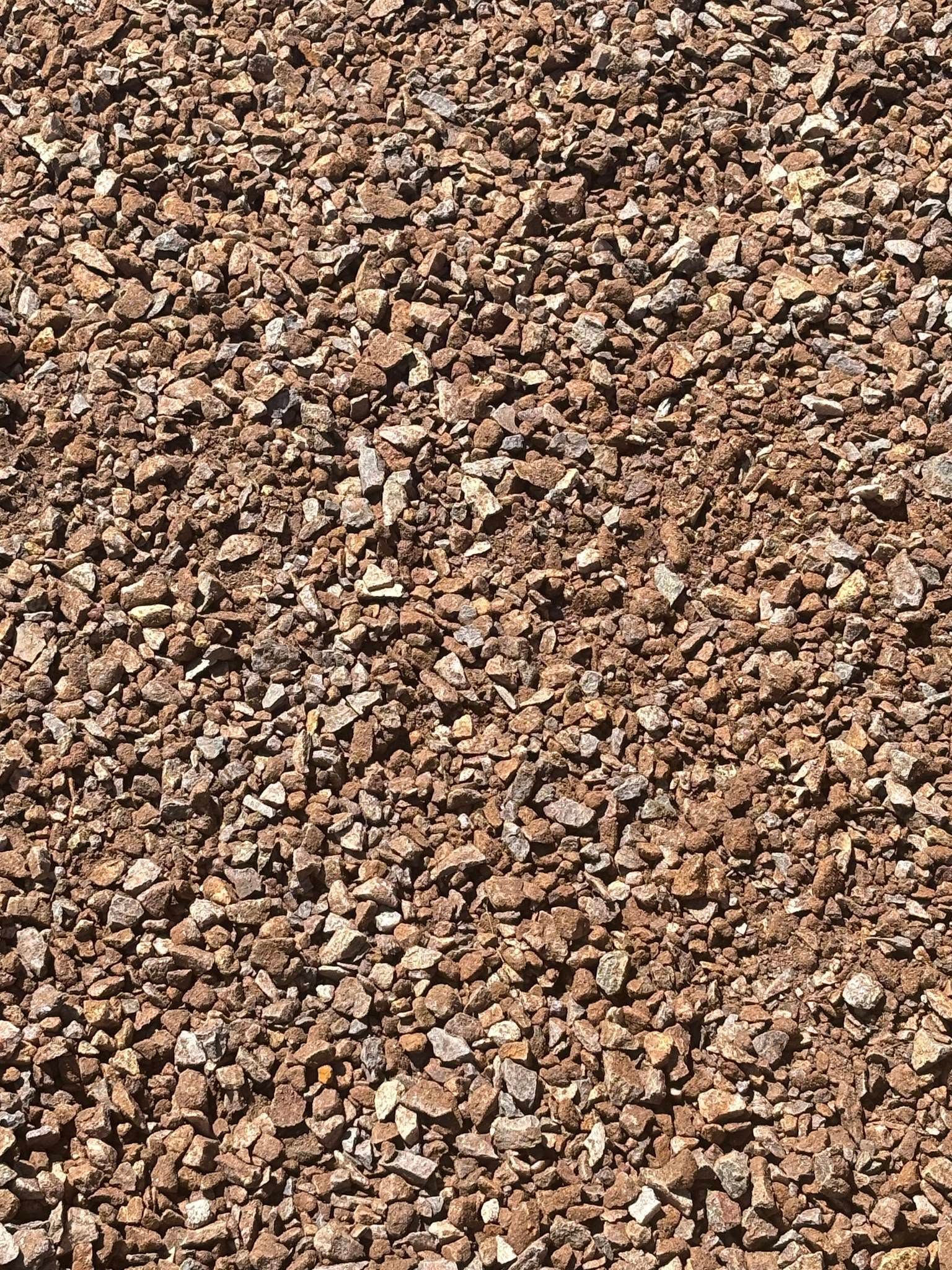 Close-up of brown and tan gravel stones covering the ground