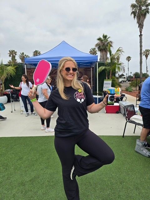 PWI 2026 Pickleball Tournament - a woman with a pink racket