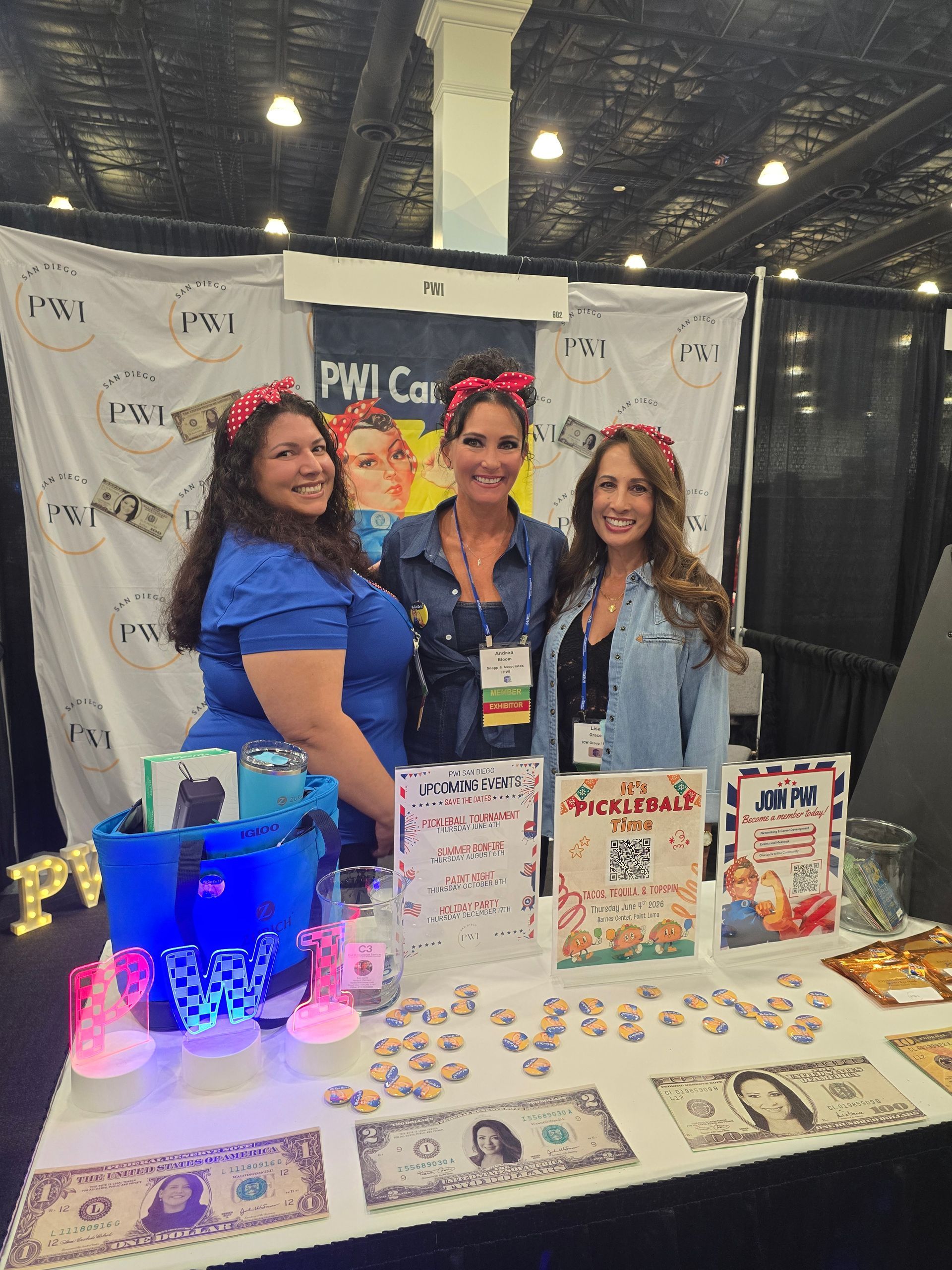 Andrea Bloom and two other women at the PWI booth at I-Days