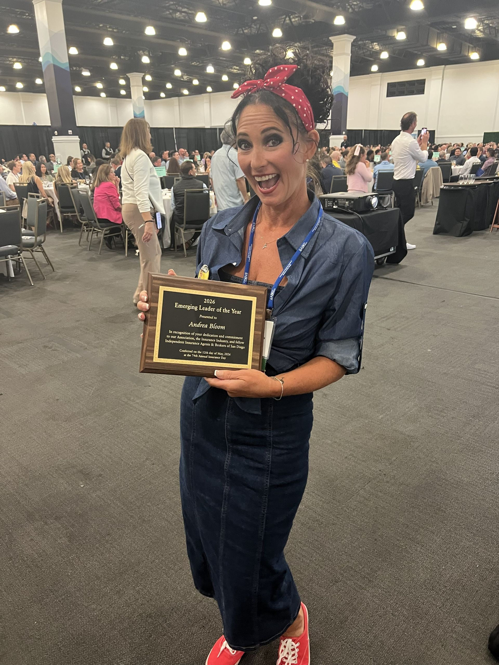 Andrea Bloom holds up 