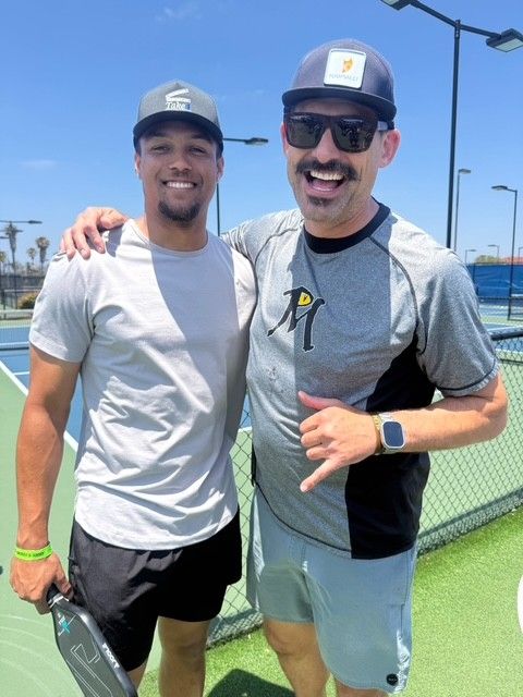 PWI 2026 Pickleball Tournament - 2 men smiling