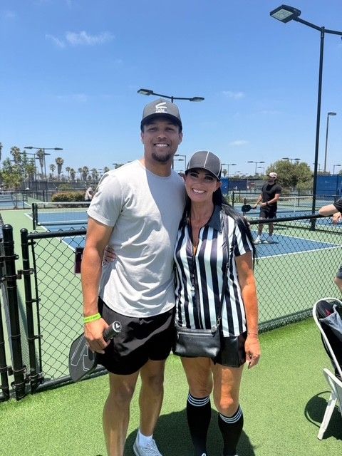 PWI 2026 Pickleball Tournament - a man and a woman smiling.