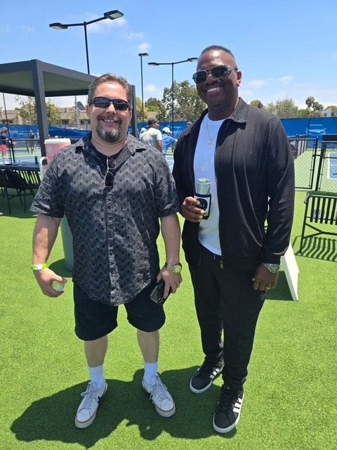 PWI 2026 Pickleball Tournament - two men smiling