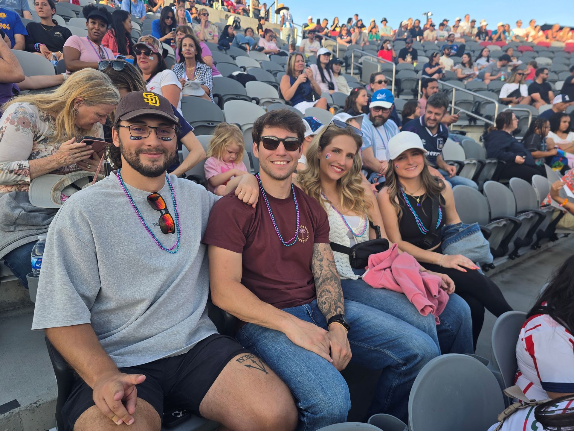 2026 Waves Soccer Game and Tailgate - members in the outdoors stands