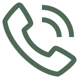 A green line drawing of a telephone on a white background.