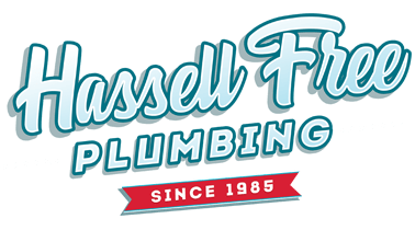The logo for hassell free plumbing since 1985