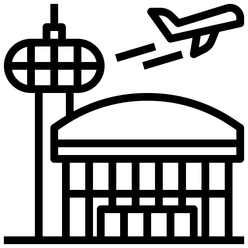 A black and white icon of an airport with an airplane flying over it.