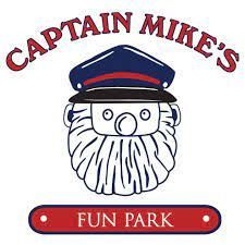 The logo for captain mike 's fun park shows a man with a beard wearing a hat.