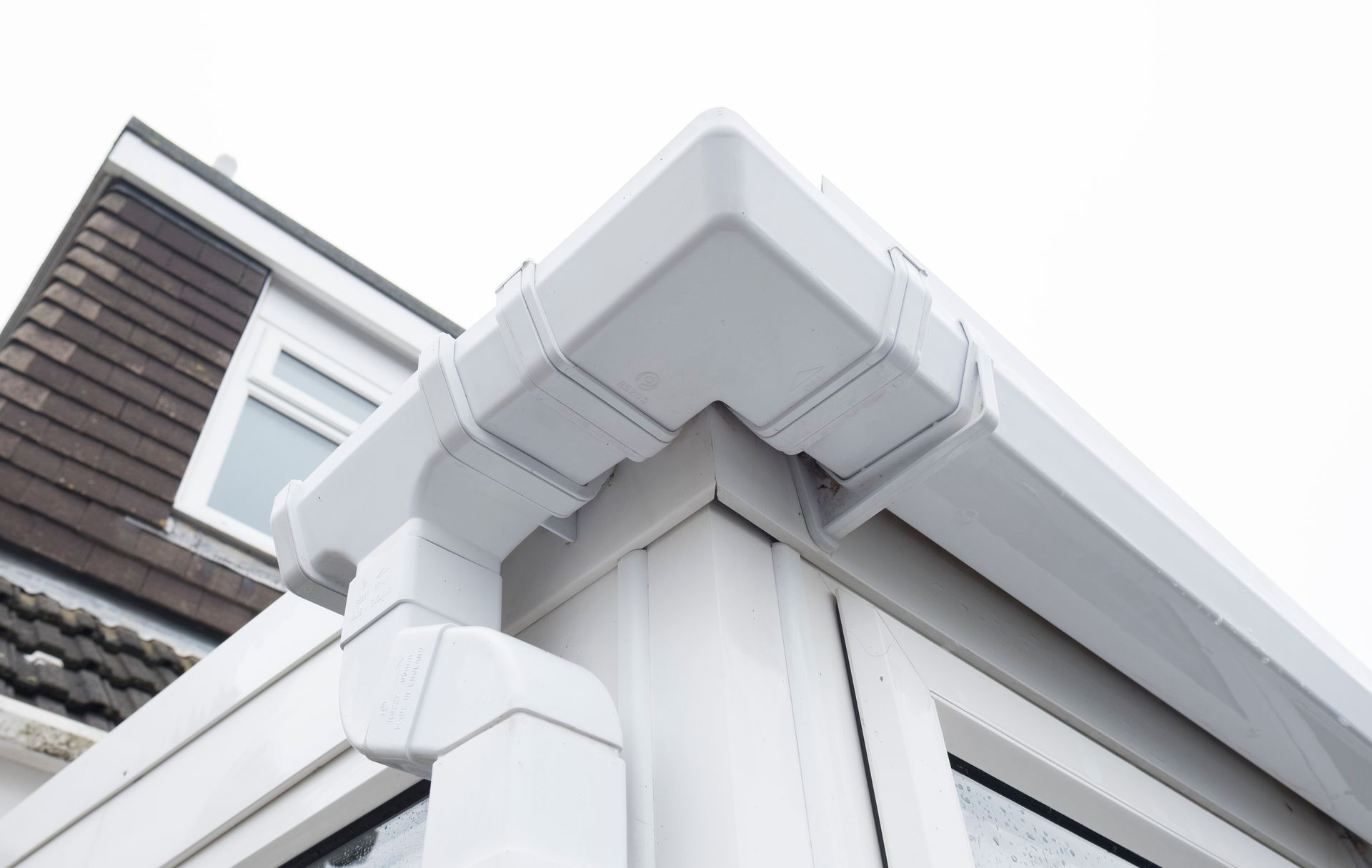 White gutters on residential property 