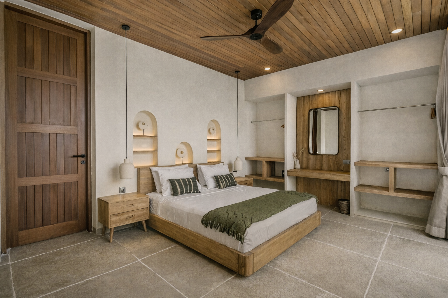 Bedroom with wooden ceiling, bed, door, shelves, and a large mirror.