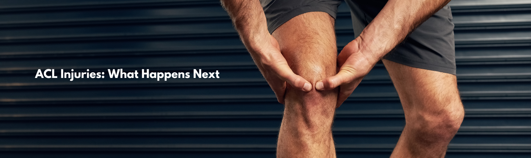 Person holding their painful knee with both hands, the kind of symptom seen after an ACL injury.
