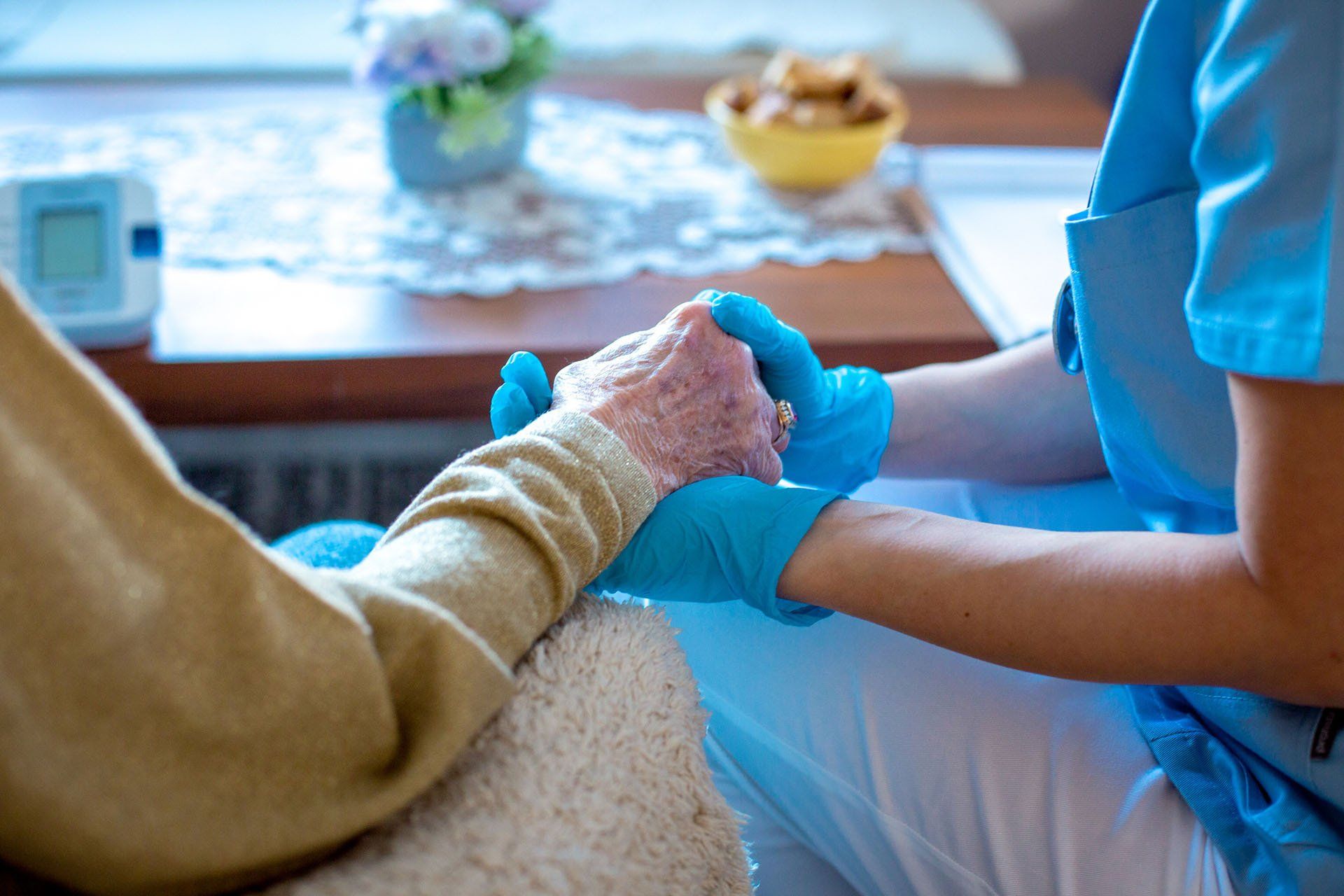 Holding a Hand of a Elderly Woman — Alexandria, LA — Direct Care Service Inc.