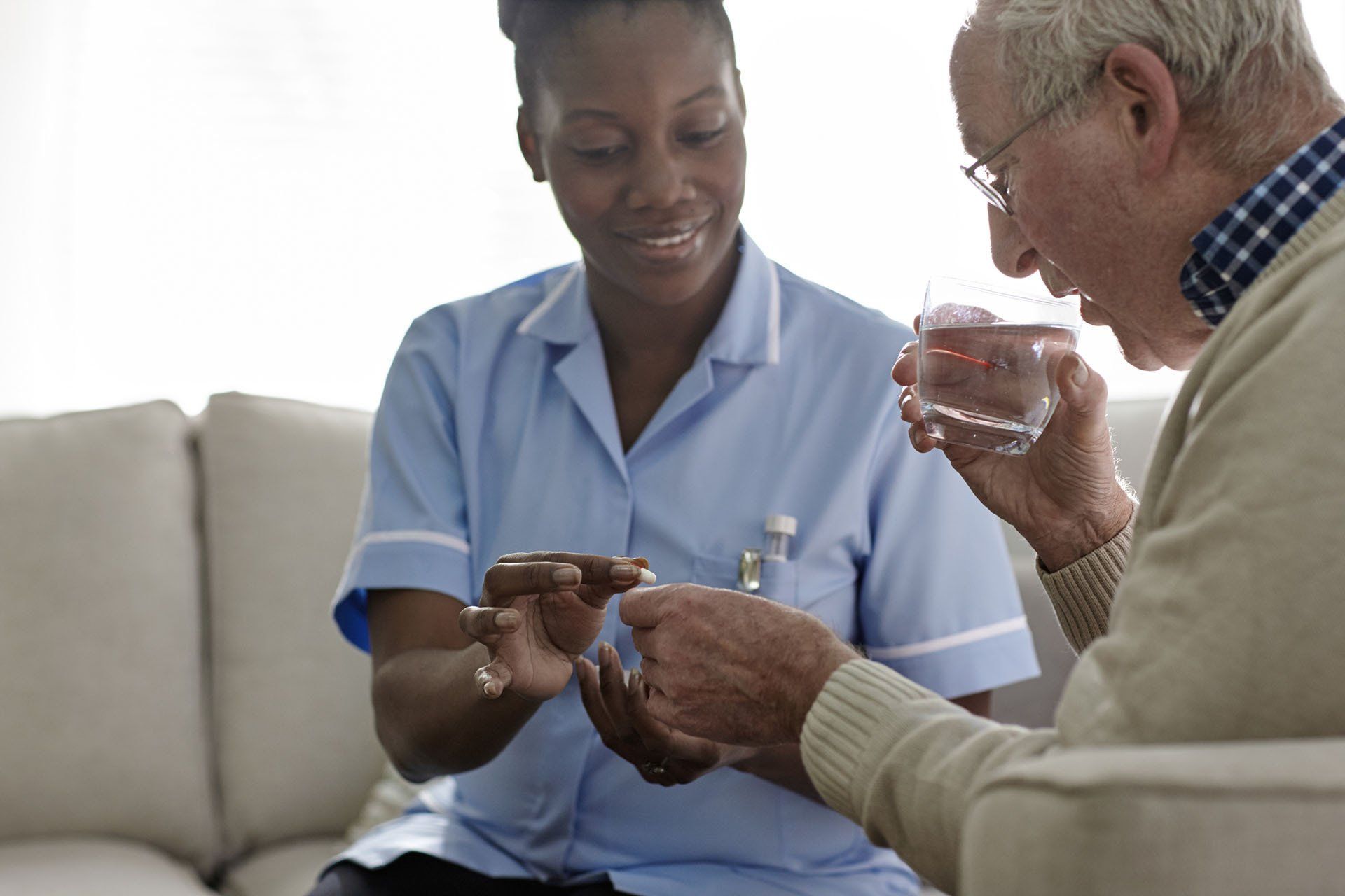 Senior Man Taking Medication — Alexandria, LA — Direct Care Service Inc.