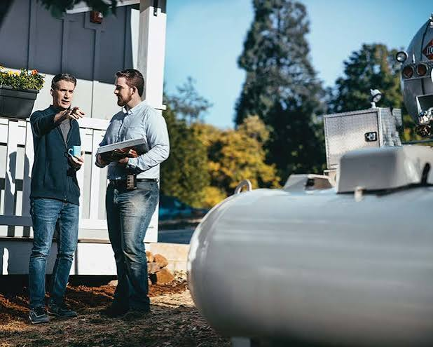 Three propane tanks displayed on a white background, featuring Southall Gas. Your source for propane