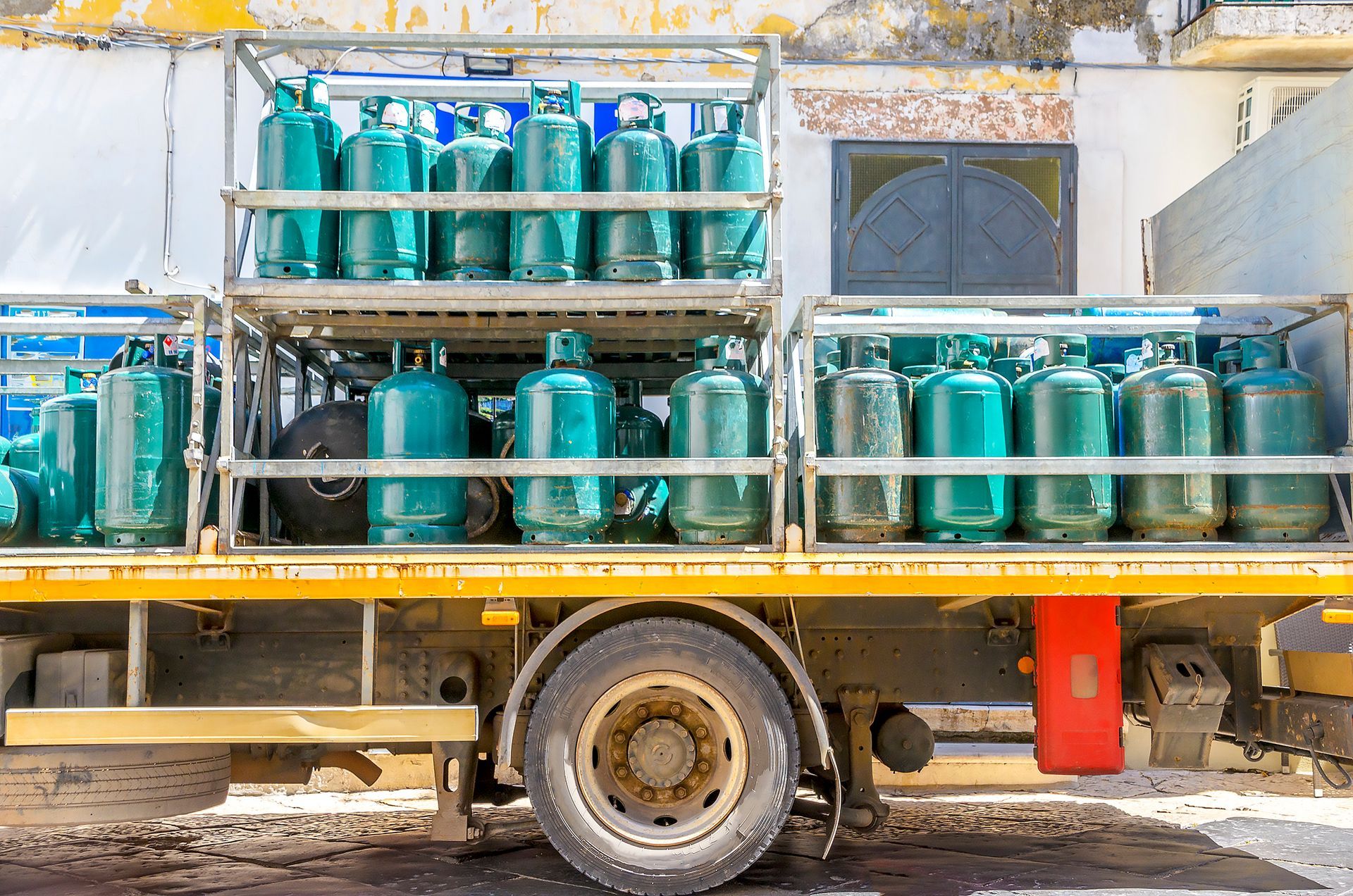 Truck loaded with gas canisters.