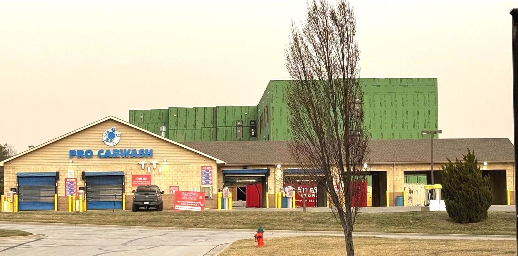 Pro car wash south location building with a truck parked in front of it.