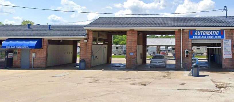 A car is parked in front of  pro car wash north location