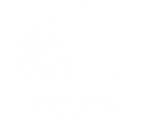 A white logo for pro car wash in smithville missouri.