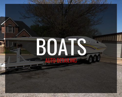 White speedboat on trailer in a driveway with “BOATS” and “AUTO FINANCE” text overlay.