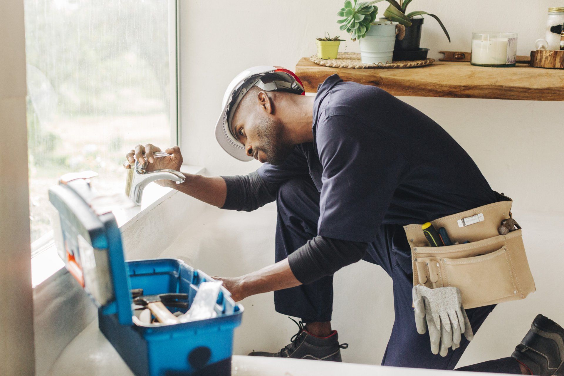Plumber Fixing Sink — Hatfield, MA — AM/PM Plumbing & Heating