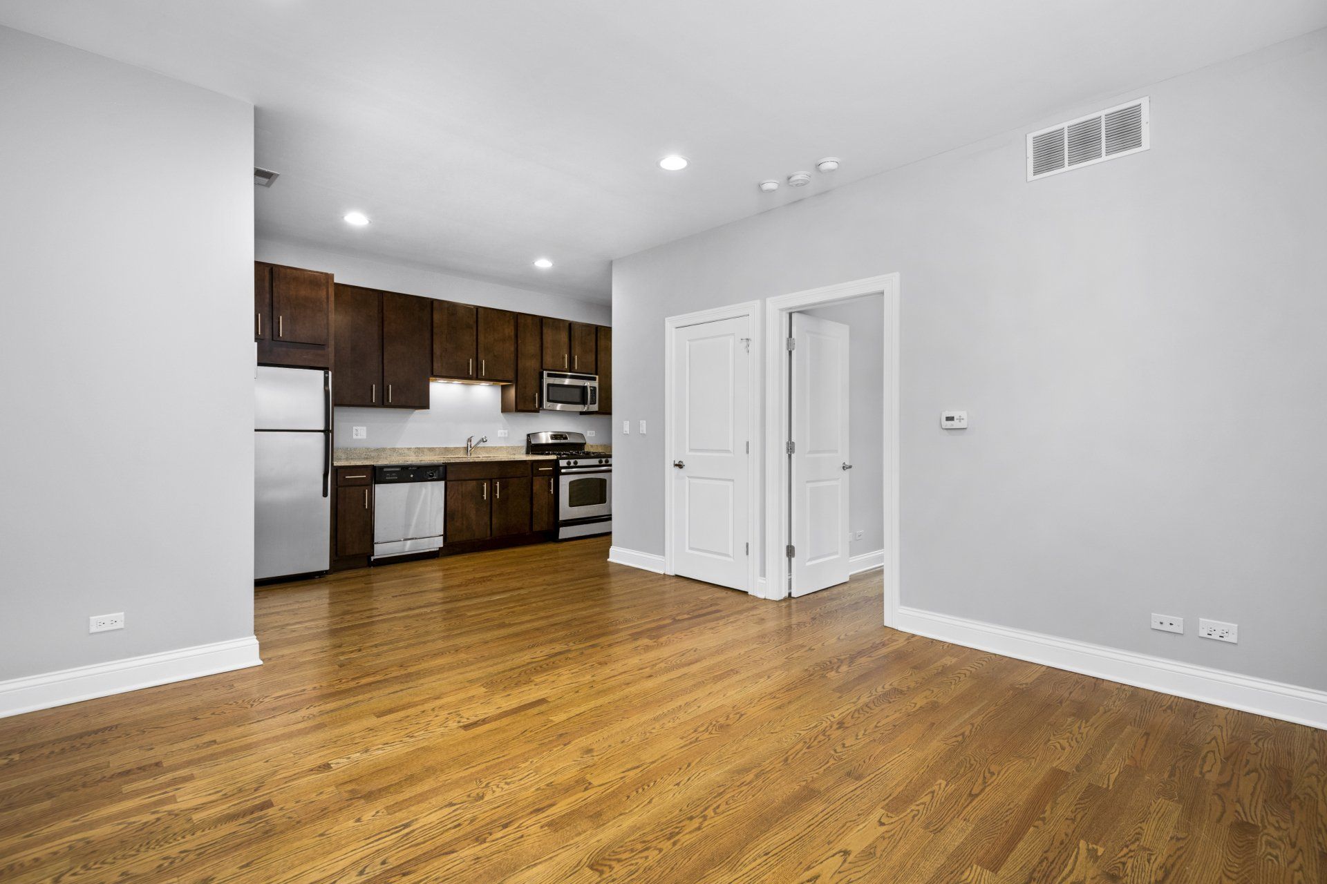 Open floor plan with living room oversees the kitchen.