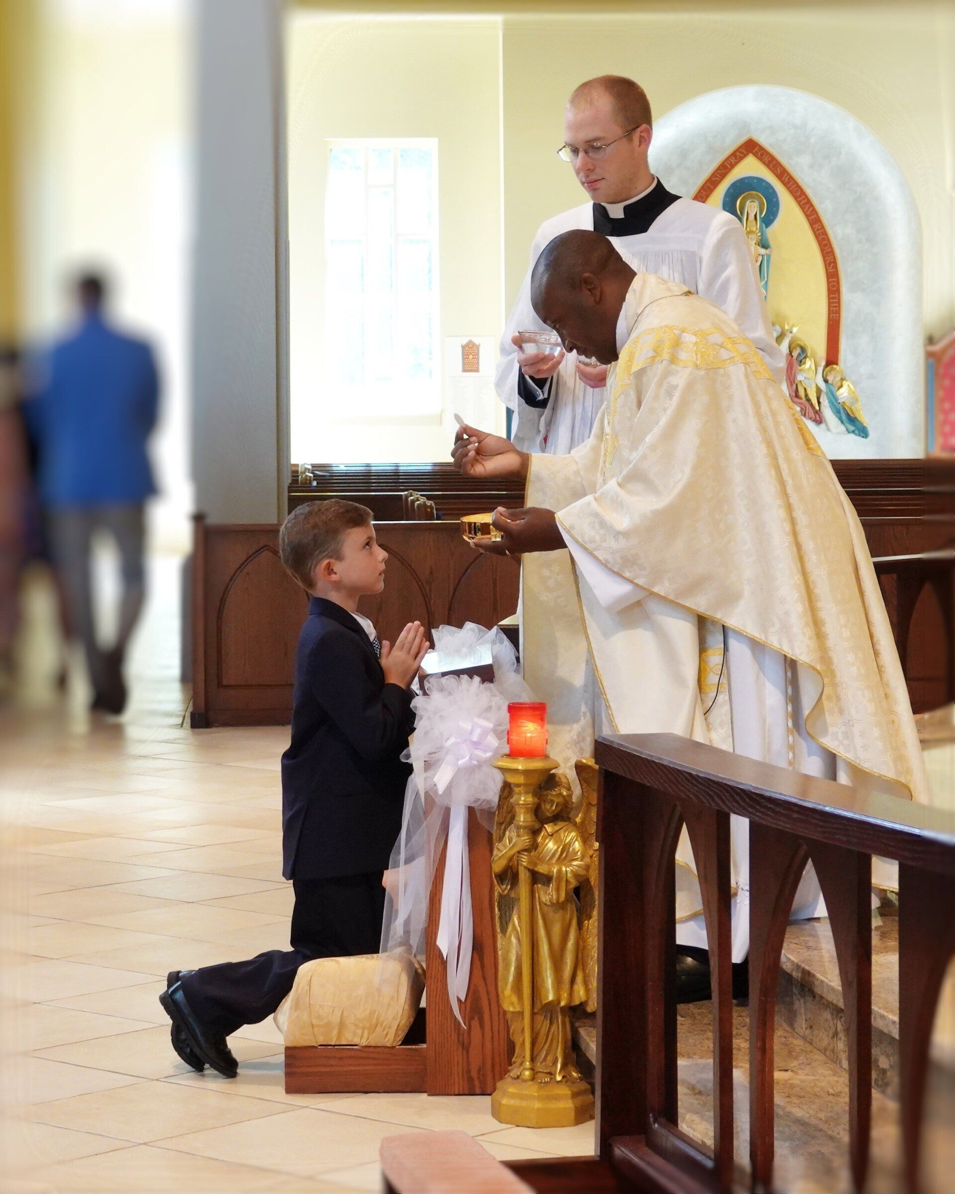 Child Receiving Communion
