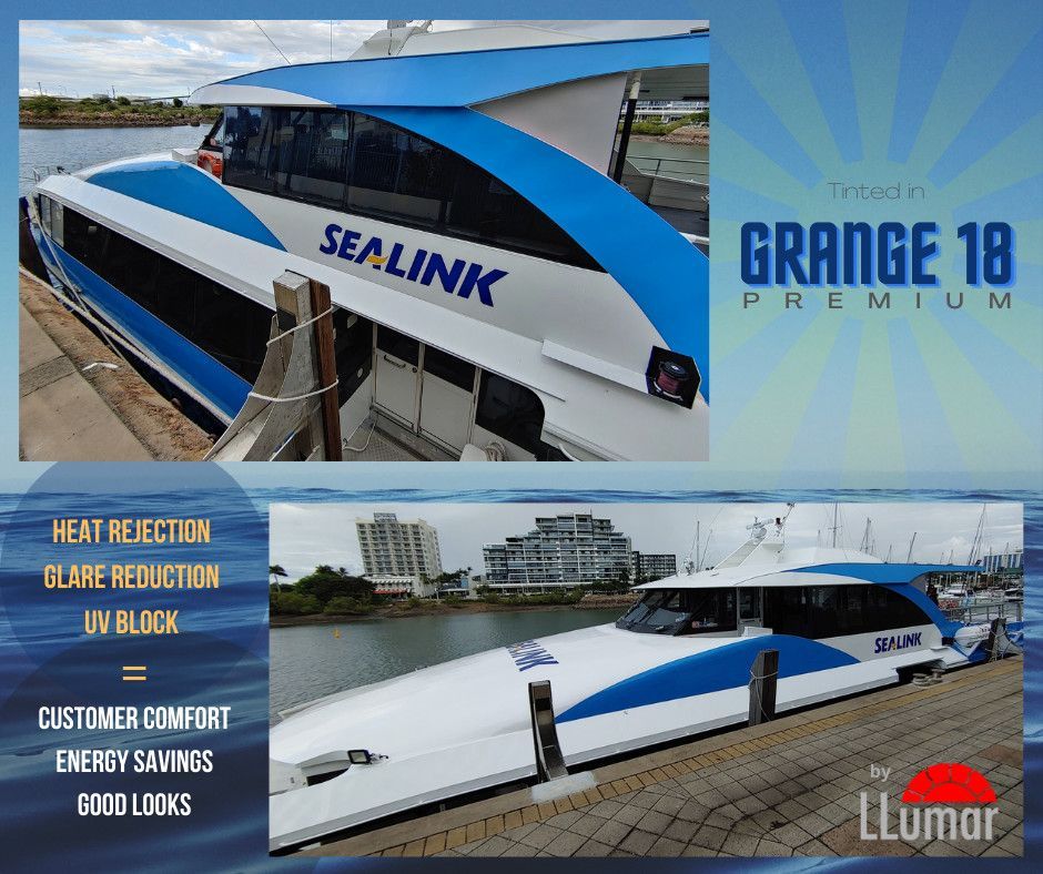 A SeaLink ferry docked at a pier, showcasing LLumar Grange 18 Premium window film for heat, glare, and UV protection.