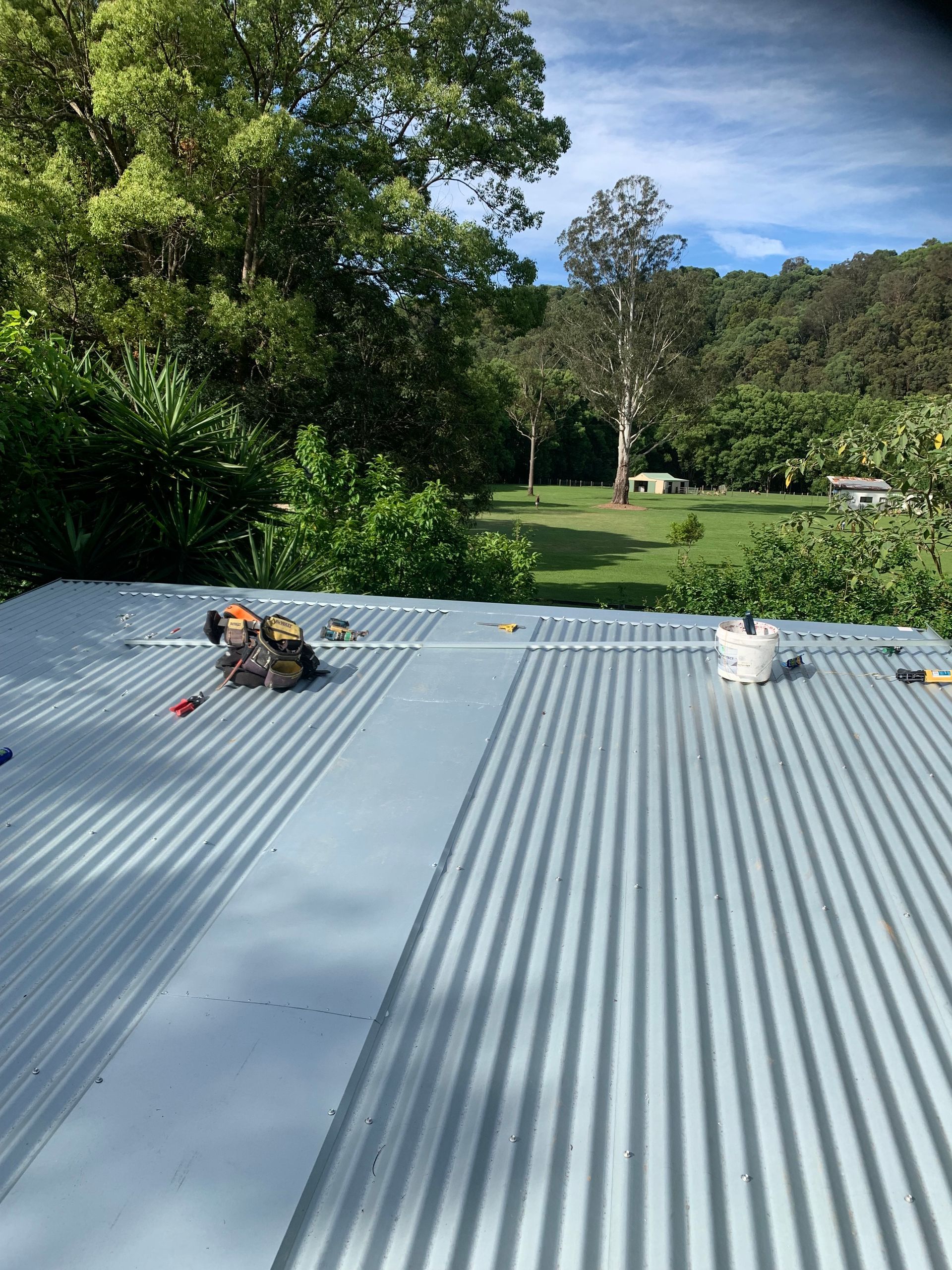The top of a metal green roof — Blue Sky Roofing NSW In Mullumbimby, NSW