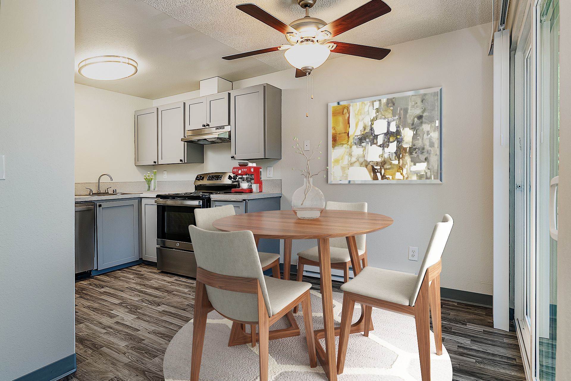 Alternate photo showing the dining area with the kitchen in the background