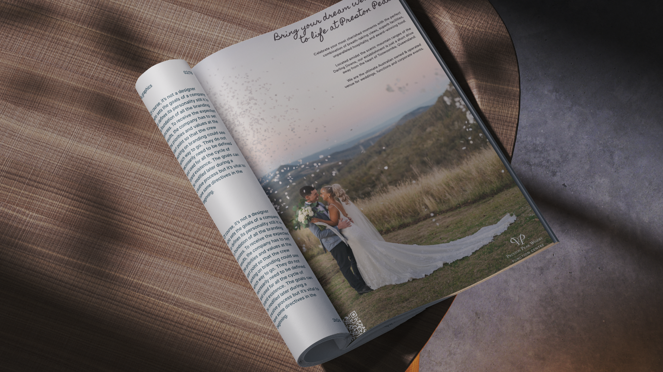 Open magazine on a sunlit floor, showing a bride and groom photo on the right page.