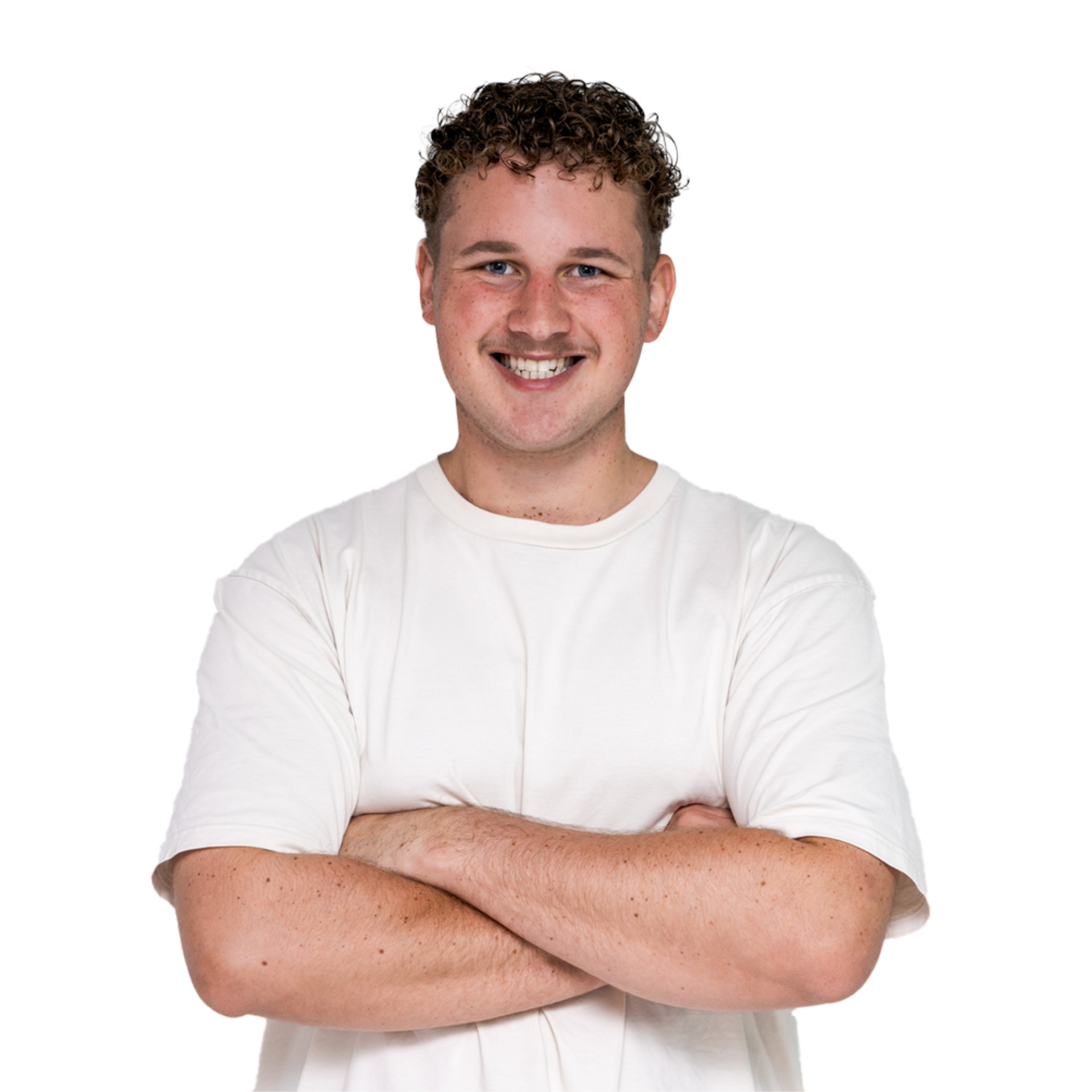 Smiling person in a white T-shirt with arms crossed on a white background