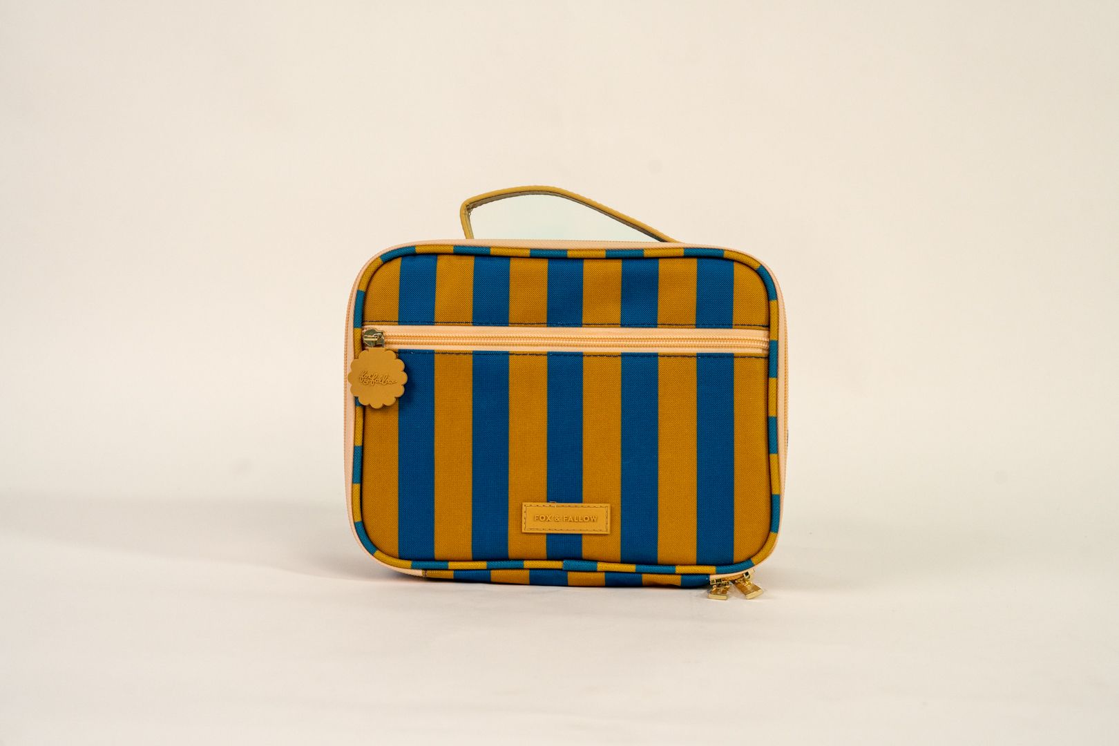 Blue-and-orange striped handbag with a top handle on a plain white background