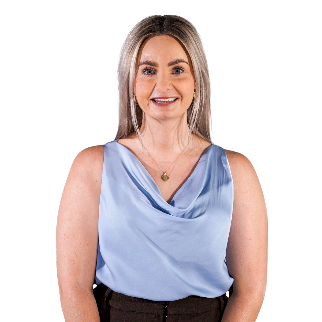 Smiling woman in a light blue blouse against a white background