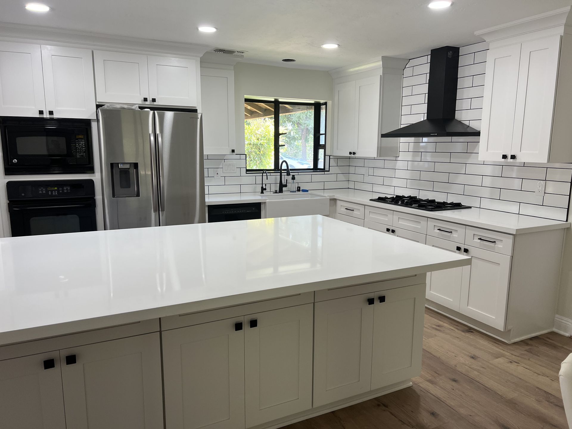 Contemporary Transitional Kitchen Remodel by Straight Edge Builders project photo