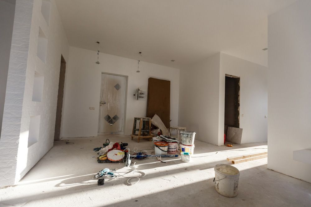 A Room With White Painted Walls And A Lot Of Tools On The Floor — Yves De Wilde Quality Painting Services In Lismore, NSW